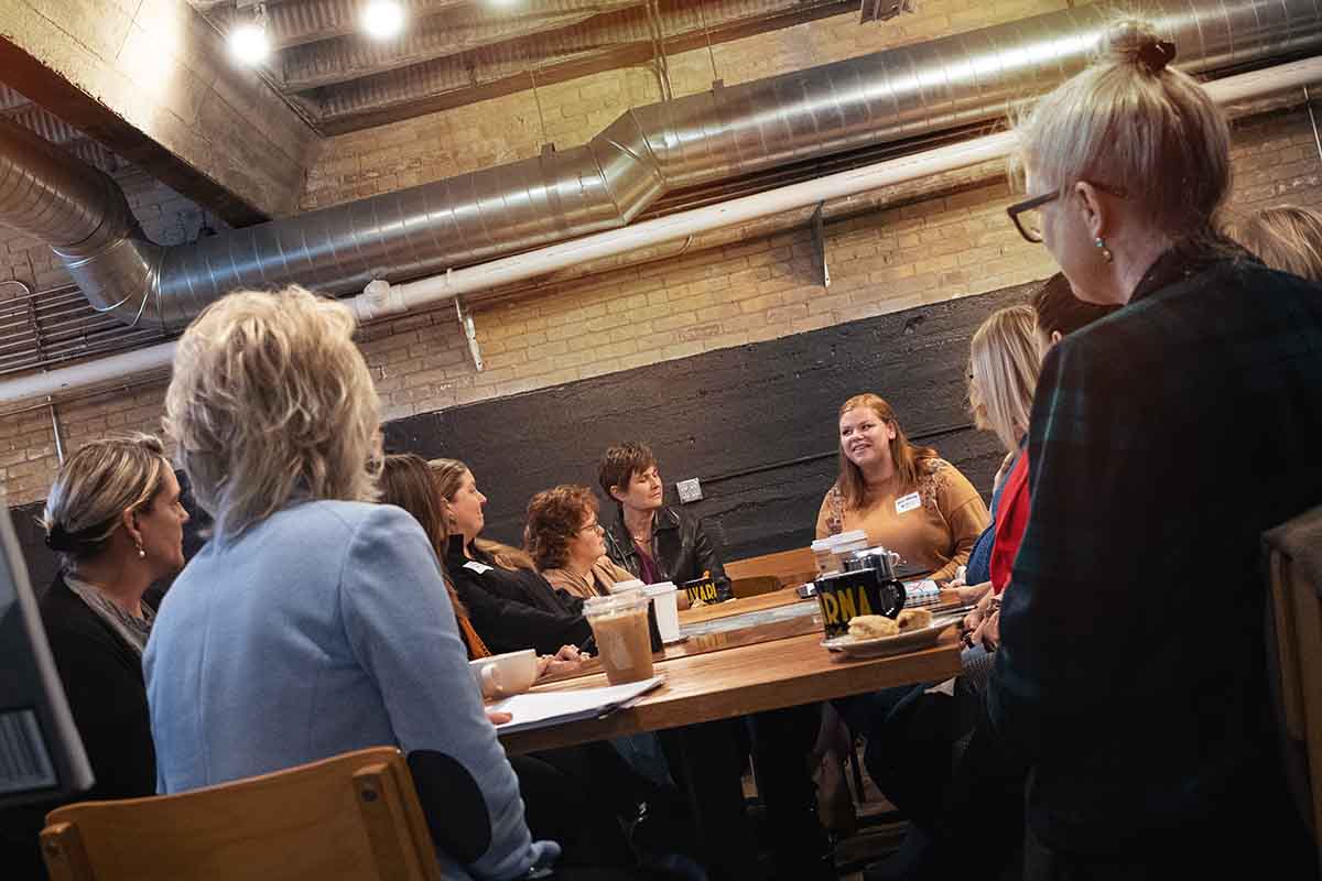 women attending a caffeinated conversations event
