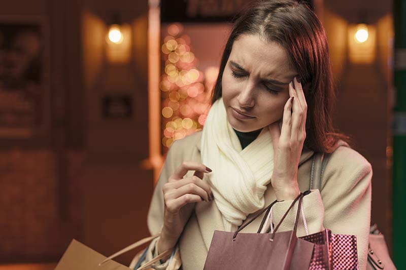 stressed woman holiday shopping