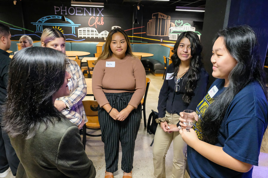 Multi Ethnic students hanging out in the Phoenix Club