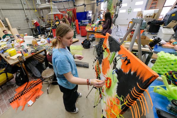 Student works on mixed media sculpture