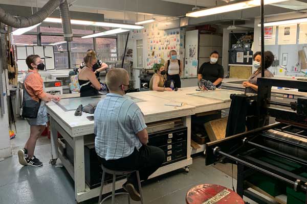 Students tour print studio while studying abroad