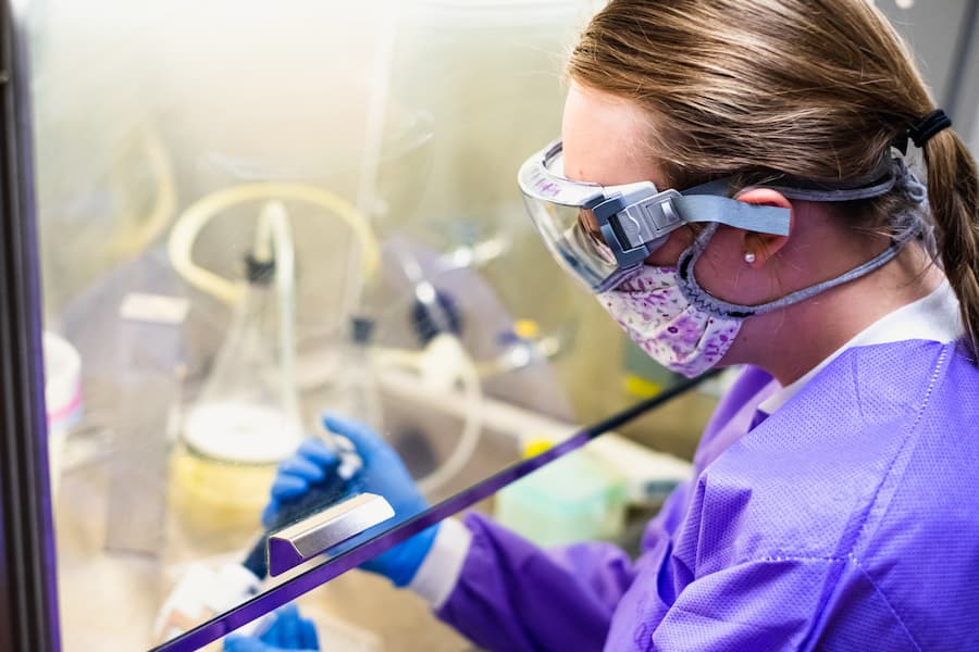 Biology student works in lab
