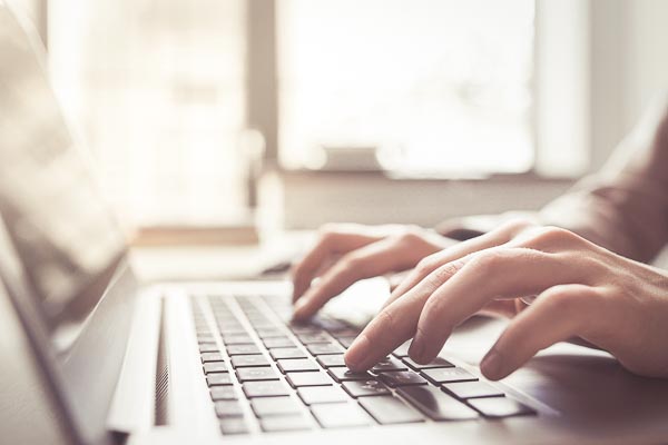 Person usign a laptop