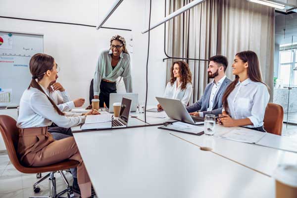 Group of collegues attend meeting