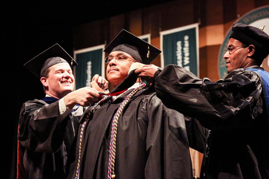 UW-Green Bay Business Master's Graduate receiving robes