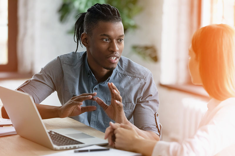 Man working with a mentor
