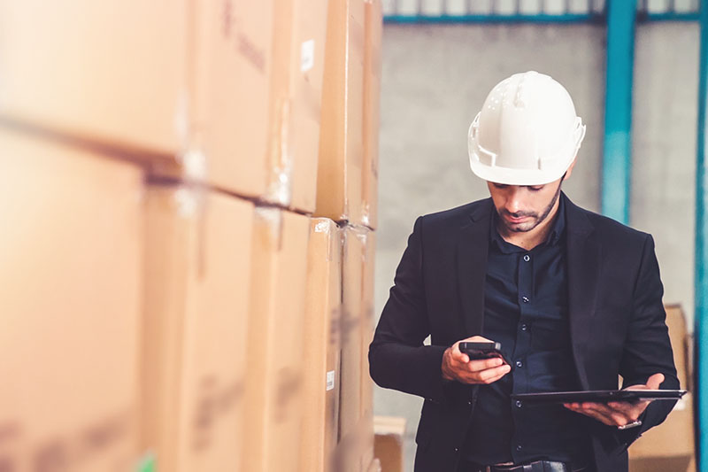 Supply chain manager using tablet