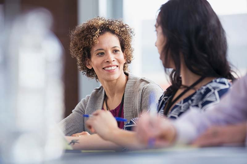 two women in conversation