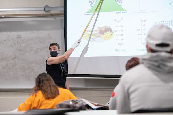 Marinette professor teaching class