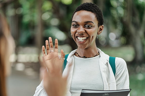 Women with hands raised