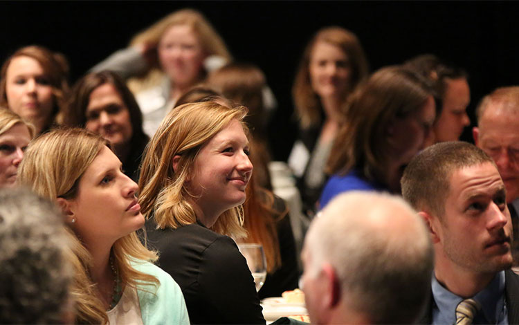 audience of students at a business event