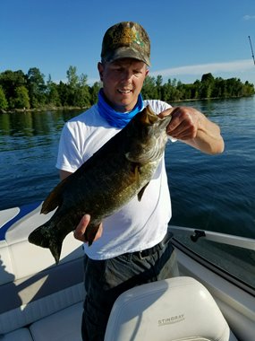 Brian Merkel holding a bass