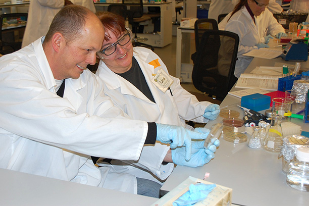 Merkel Grubisha working in a lab
