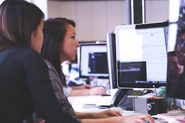 Students work at computers during class