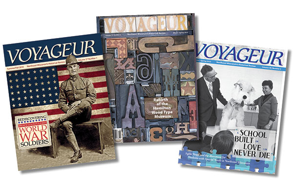 Three separate issues of Voyageur Magazine