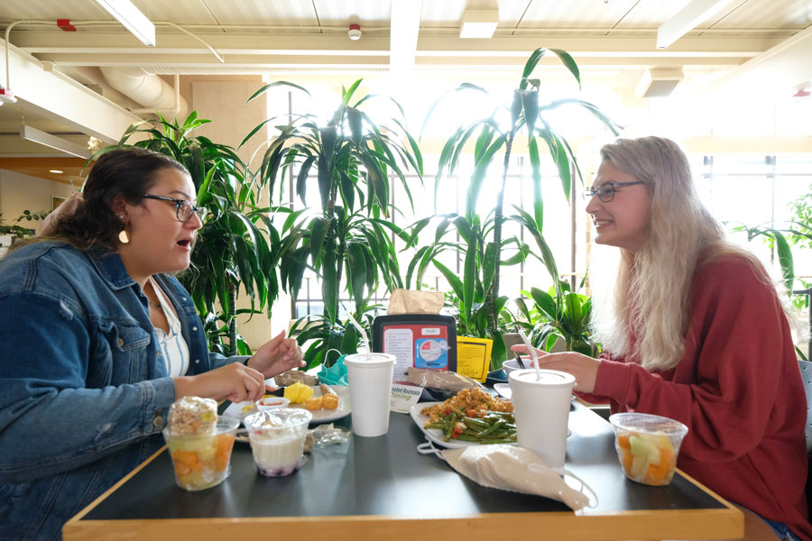 Two UW-Green Bay students enjoy lunch on campus
