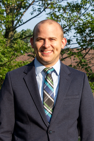 Adam  Neveau Associate Director for Residential Education
