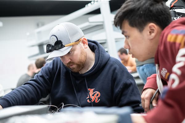 Students focused on electrical engineering lab