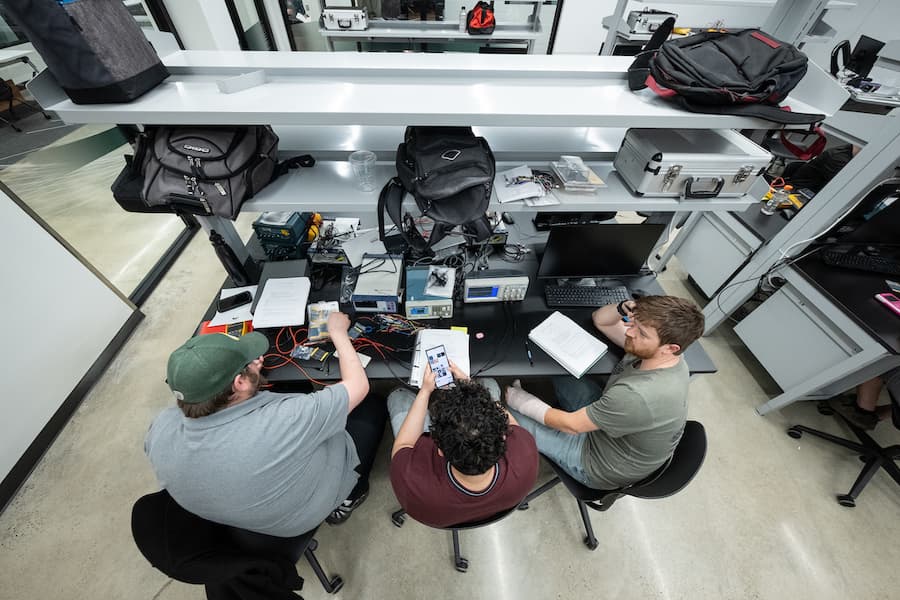 Overhead shot of students in the electrical engineering lab