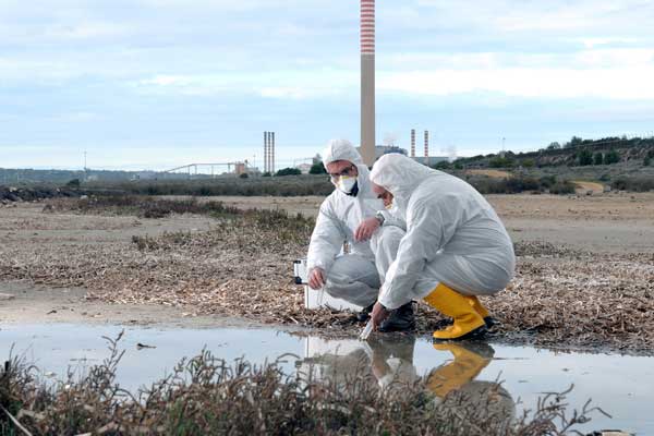 Environmental Engineers study bio hazards at water treatment plant
