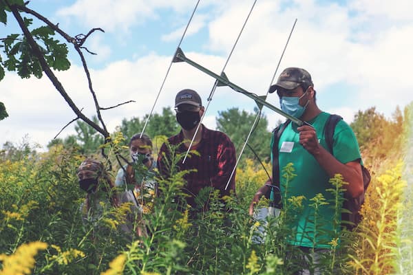 Students set up radio telemetry to test organisms after they have been tagged