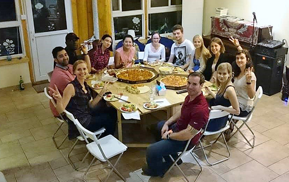 Group of students eating a meal