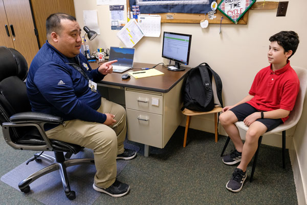 UW-Green Bay Master of Social Work graduate meets with young child
