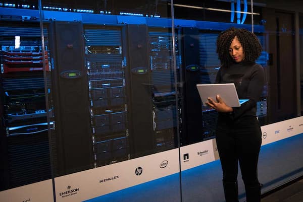 Female with computer working in Cybersecurity