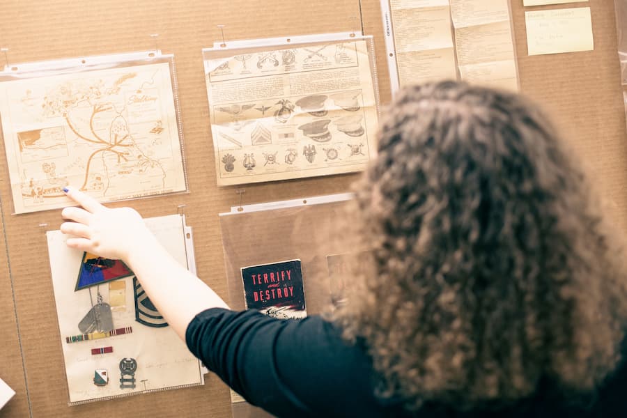 students review a display of university archives