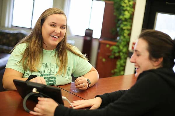 Resident visiting the housing desk