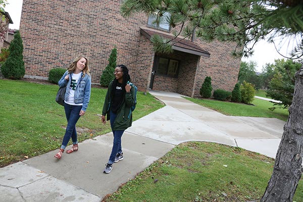 UWGB Students exiting a residence hall