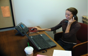 Woman on the phone at a desk