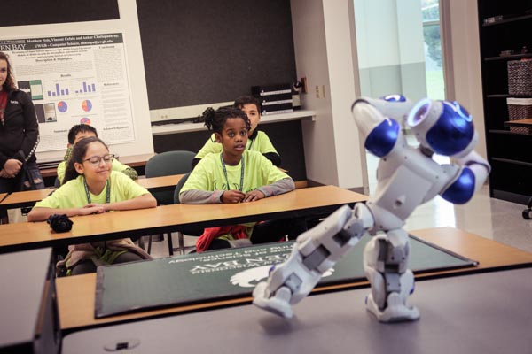 Phuture Phoenix 5th graders awed by dancing robot demonstration
