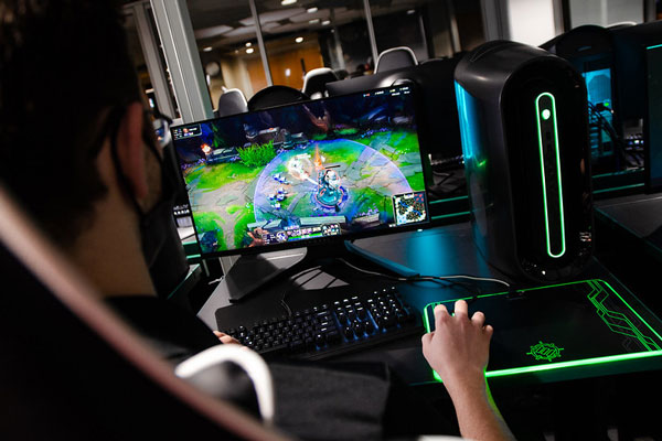Student plays computer game in UW-Green Bay's esports lounge