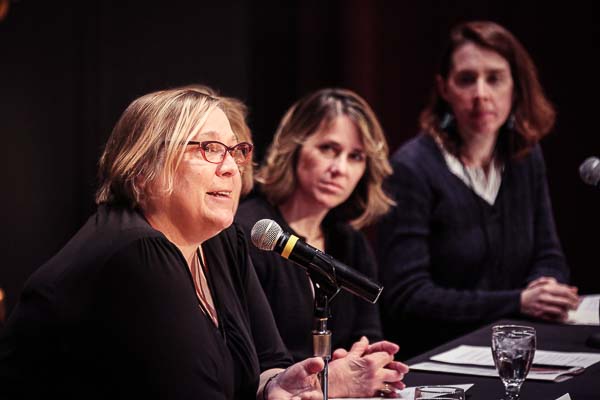 Christine Smith speaking on a panel of experts