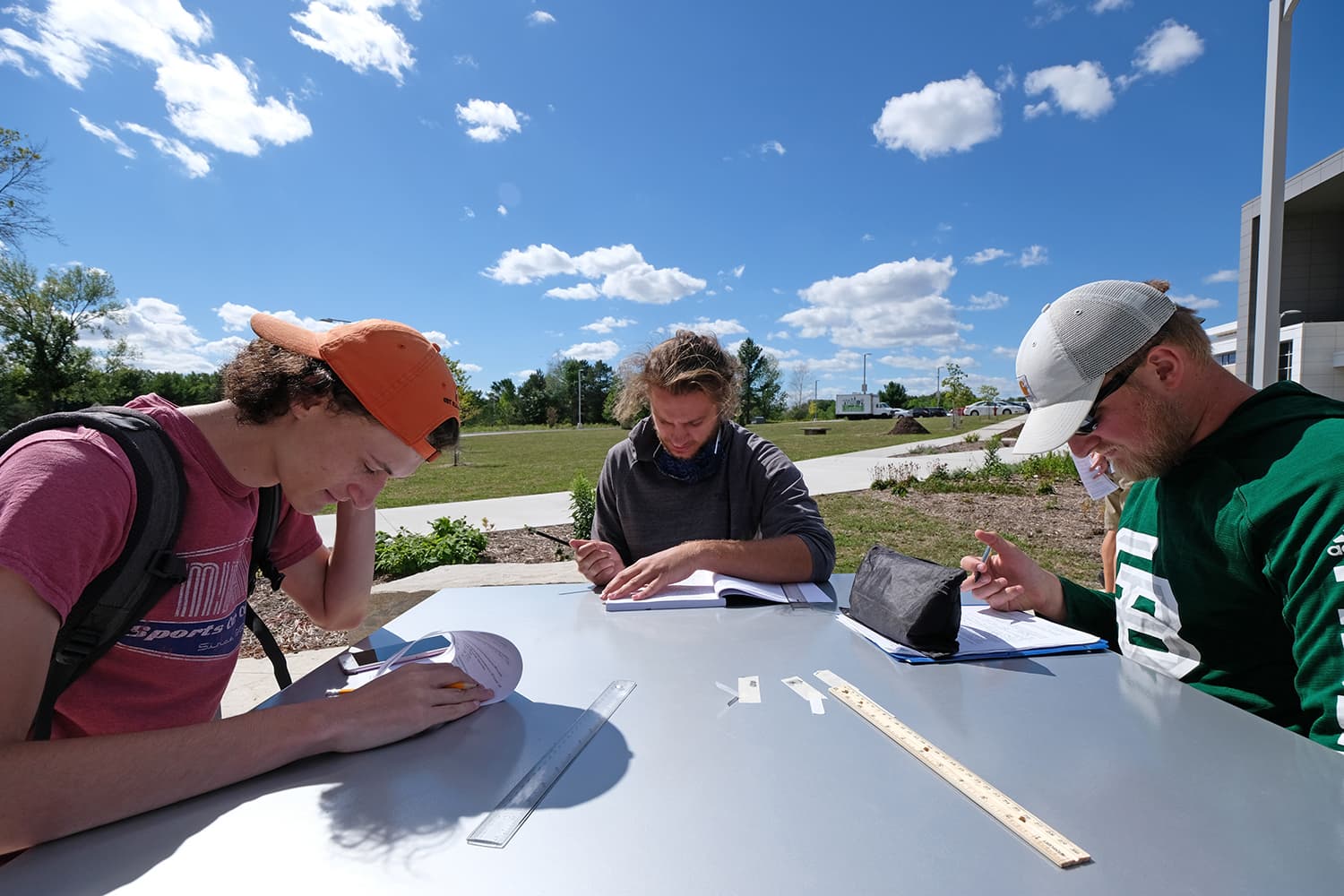 Image of students studying outside
