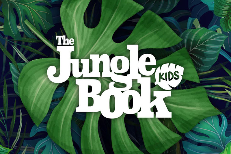 Tropical leaves with text Jungle Book Kids