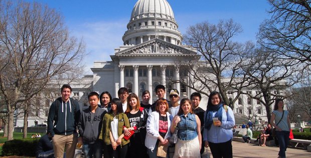 Students pose in front of capitol