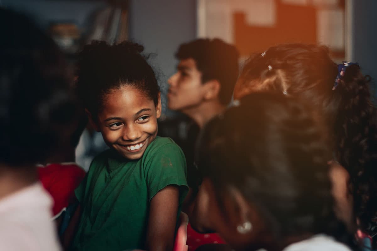 Students listening to director