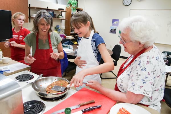 Students work with community members