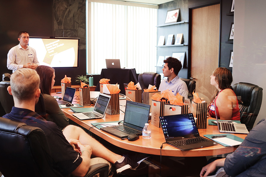 Employees attend meeting