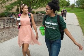 two students walking by the union