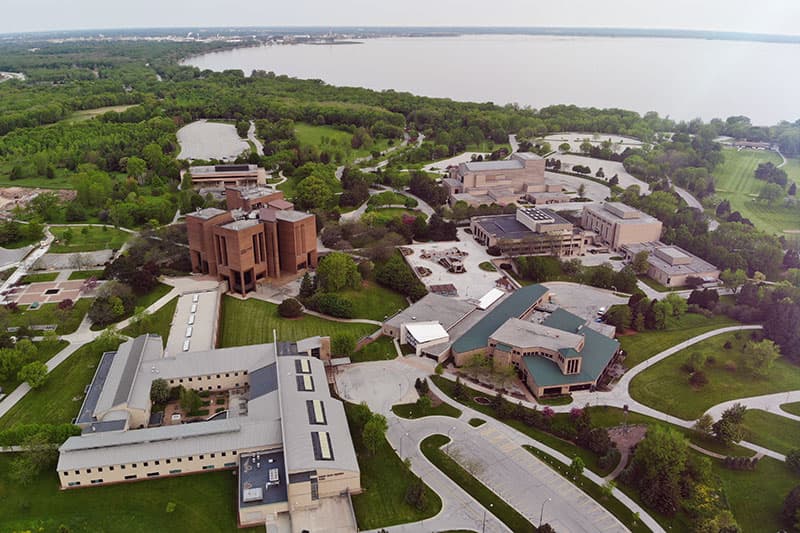 Aerial view of Green Bay campus with view of Bay of Green Bay