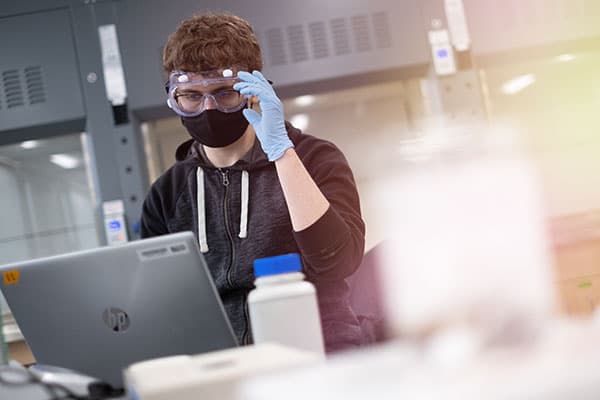 Student in classroom during COVID-19