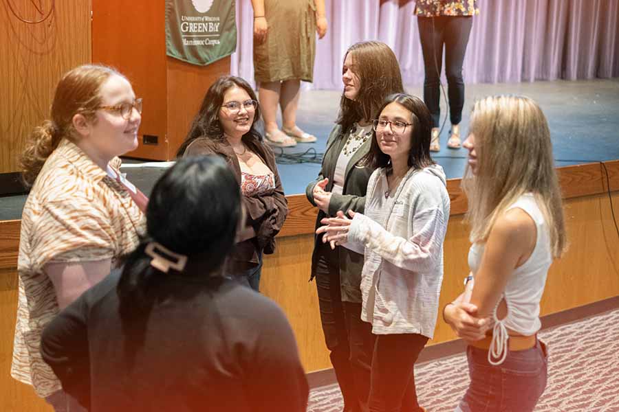 students talking during an information session