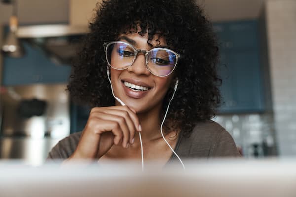 African American female attends online seminar