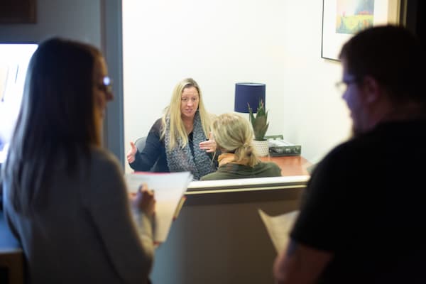 Students observe mock counseling in skills lab