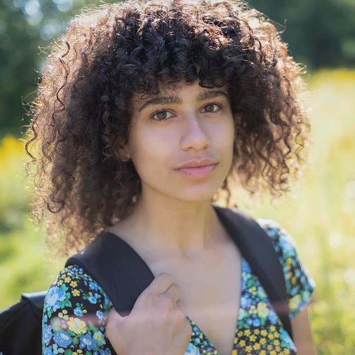 Nadia Neziri outside in a prairie