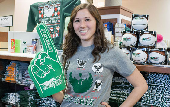 Female student with UWGB merch