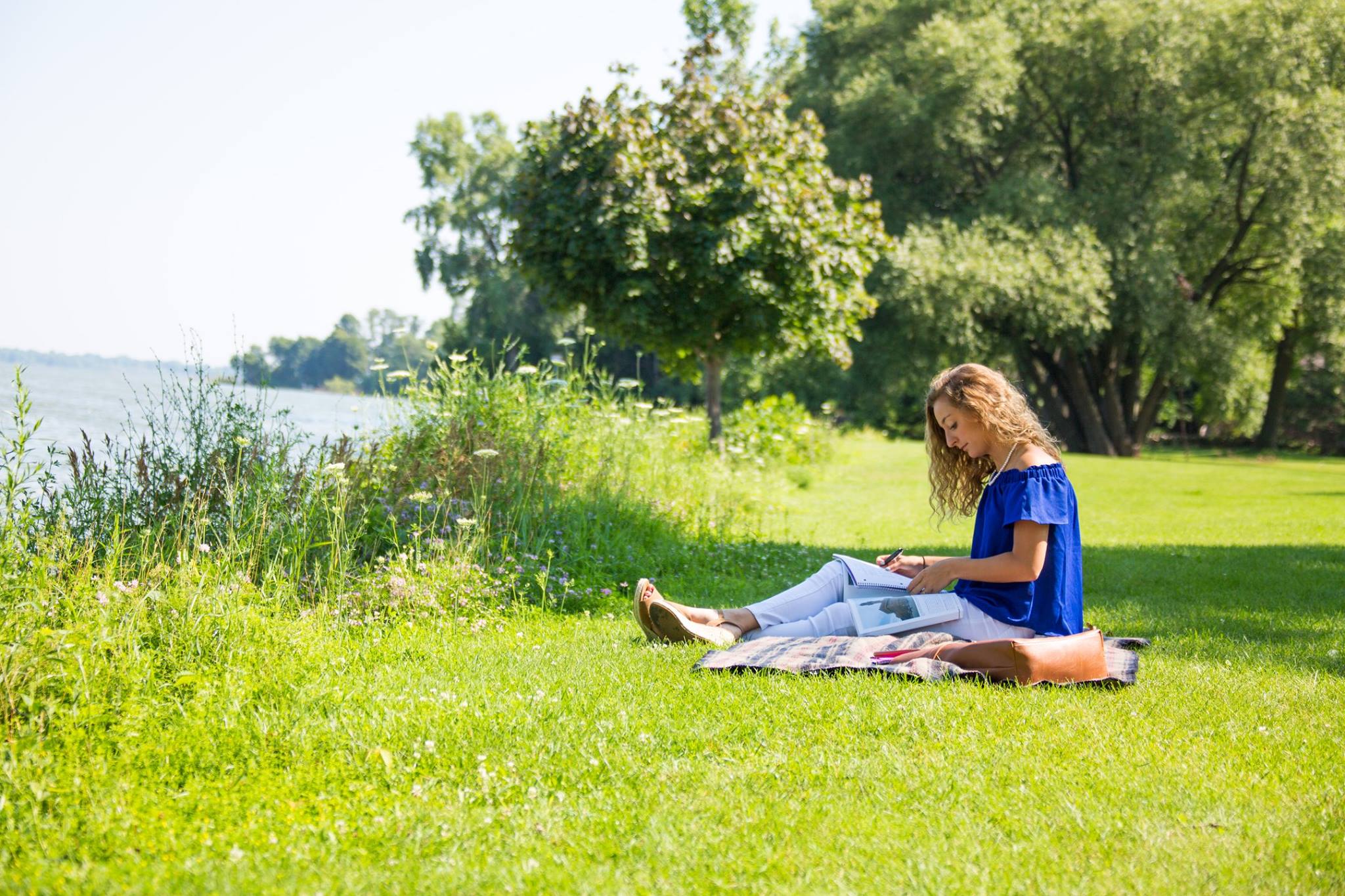 Person sitting by the Bay